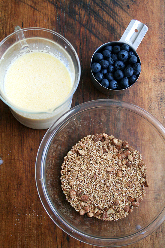 The various components of the baked steel cut oatmeal: milk mixture, oat mixture, berries. 