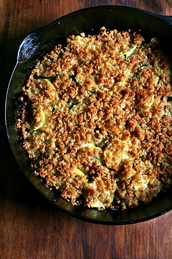 This summer squash gratin couldn't be simpler to throw together, and unlike so many gratins, this one is not laden with cream and cheese. You also can't mess it up. The layer of vegetables can be thin or thick. There's no perfect ratio of squash to topping. This dish is rustic. It's fast. It's easy. Go wild. // alexandracooks.com