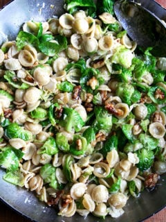 In this super-fast pasta dish, a simple brown butter sauce dresses orecchiette, Brussels sprouts, toasted walnuts and Pecorino. While any pasta shape will work, orecchiette, which shares the same shape as the Brussels sprout leaves, is particularly fun. // alexandracooks.com