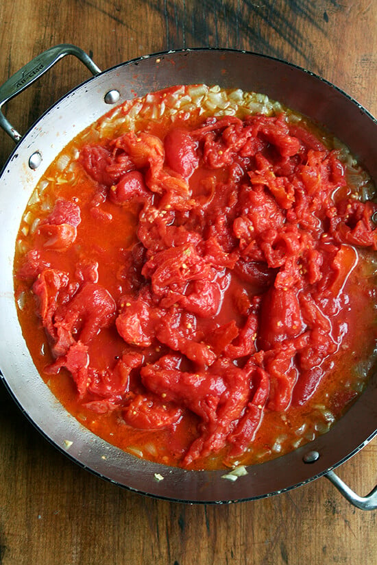 Overhead view of the everyday pan after adding the tomatoes