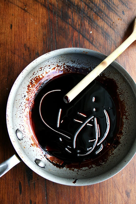 Overhead view of reduced balsamic in a sauce pan.