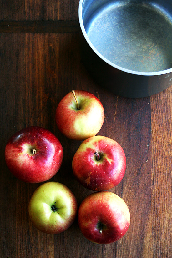 Empire apples on a board.