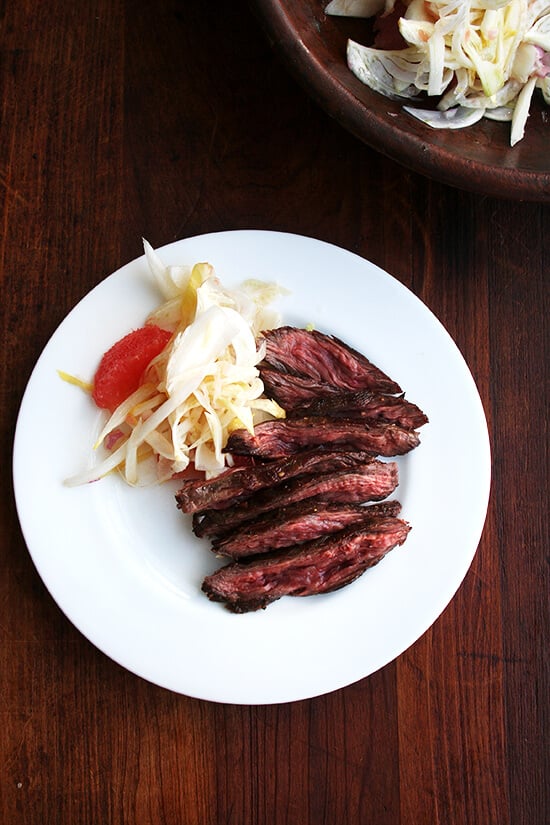 sliced steak with salad