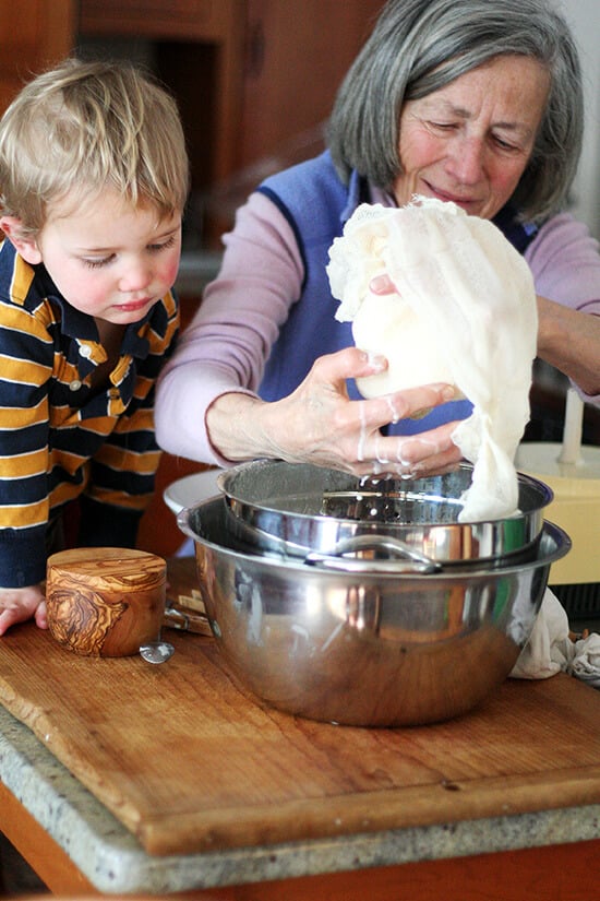 squeezing the cheese cloth