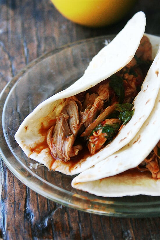 A plate of chicken tinga tacos.