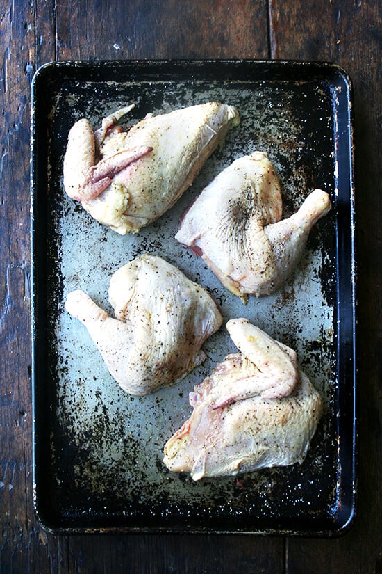 chicken on a sheet pan, ready for the oven