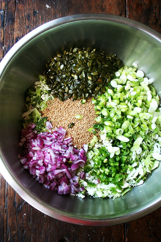 A large bowl with all of the ingredients for the salad ready to be tossed.