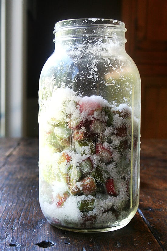 A jar of chopped rhubarb and sugar in a jar, shaken. 