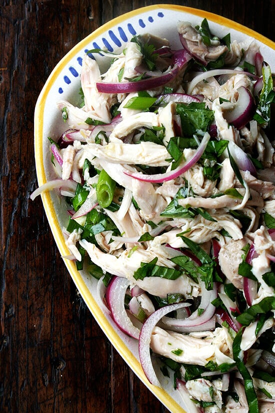 This no-mayo chicken salad is made with a simple dressing of olive oil and vinegar with big, plump pieces of chicken, lots of herbs, and a nice bite in the dressing. It's another nice no-mayo salad to serve at a summer gathering or to bring to a potluck. And there's only one thing to keep in mind while making it: less is not more. Don't be afraid to heap on those herbs. // alexandracooks.com