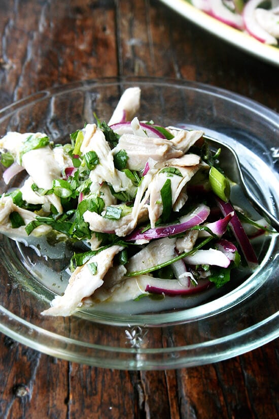 This no-mayo chicken salad is made with a simple dressing of olive oil and vinegar with big, plump pieces of chicken, lots of herbs, and a nice bite in the dressing. It's another nice no-mayo salad to serve at a summer gathering or to bring to a potluck. And there's only one thing to keep in mind while making it: less is not more. Don't be afraid to heap on those herbs. // alexandracooks.com