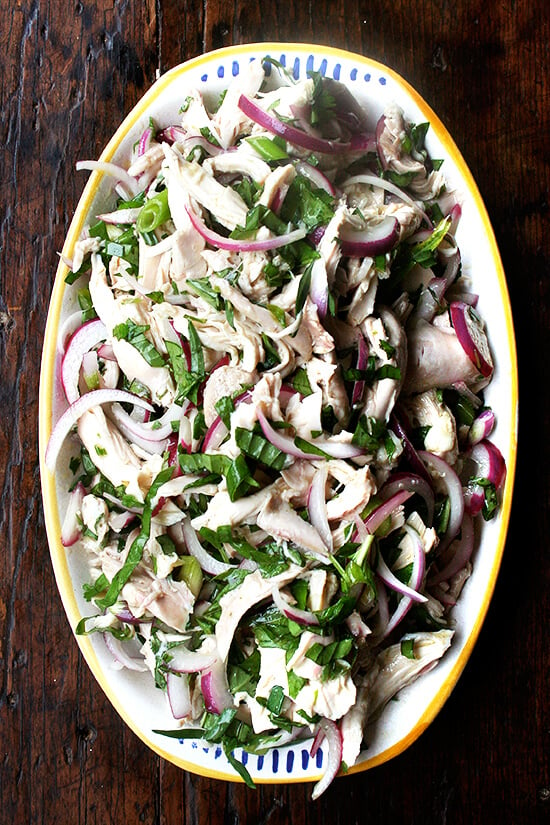 This no-mayo chicken salad is made with a simple dressing of olive oil and vinegar with big, plump pieces of chicken, lots of herbs, and a nice bite in the dressing. It's another nice no-mayo salad to serve at a summer gathering or to bring to a potluck. And there's only one thing to keep in mind while making it: less is not more. Don't be afraid to heap on those herbs. // alexandracooks.com