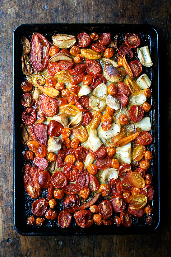 A sheet pan loaded with roasted vegetables.