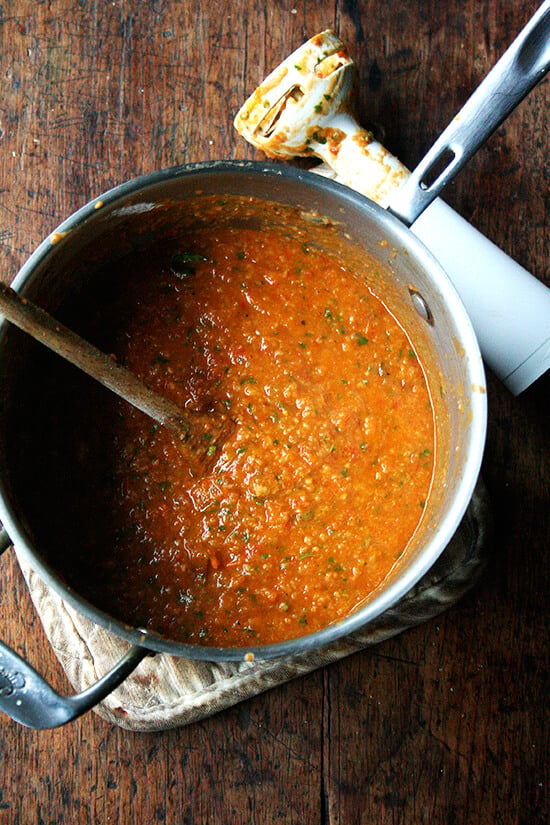 A pot of puréed roasted tomato and bread soup. 