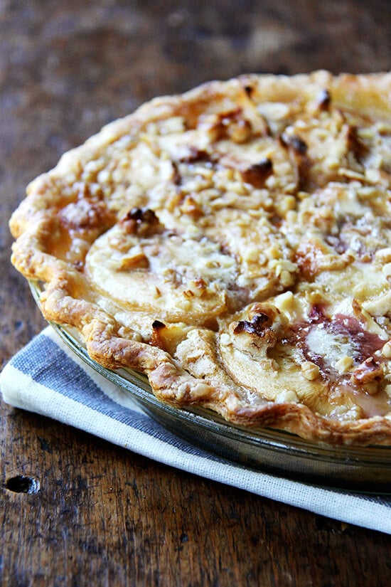 German peach pie, which may or may not be German at all, is like an open-faced pie made with four halved, peeled peaches topped with a butter-sugar-egg mixture and a small sprinkling of nuts. When it bakes, this vanilla custard bubbles around the peach halves, which, after the hour in the oven, become spoon tender and are utterly delicious. Vanilla ice cream is a must as is a crew to help polish off the spoils, though pie for breakfast isn't the worst thought either. // alexandracooks.com