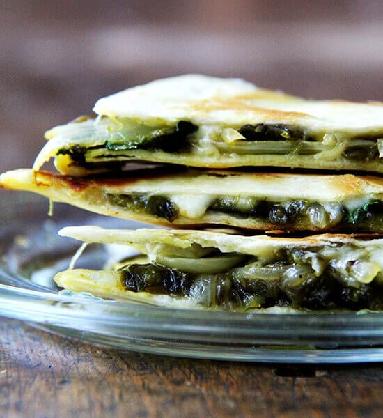 There is something so good about this simple quesadilla, about tasting each element — the smoky peppers and sweet onions, the bright cilantro, the creamy, melty Jack. As with pizza, less is more with quesadillas — a thin layer of ingredients is best. Before serving, I love stretching open the cheese-locked layers and dropping in spoonfuls of sour cream. // alexandracooks.com