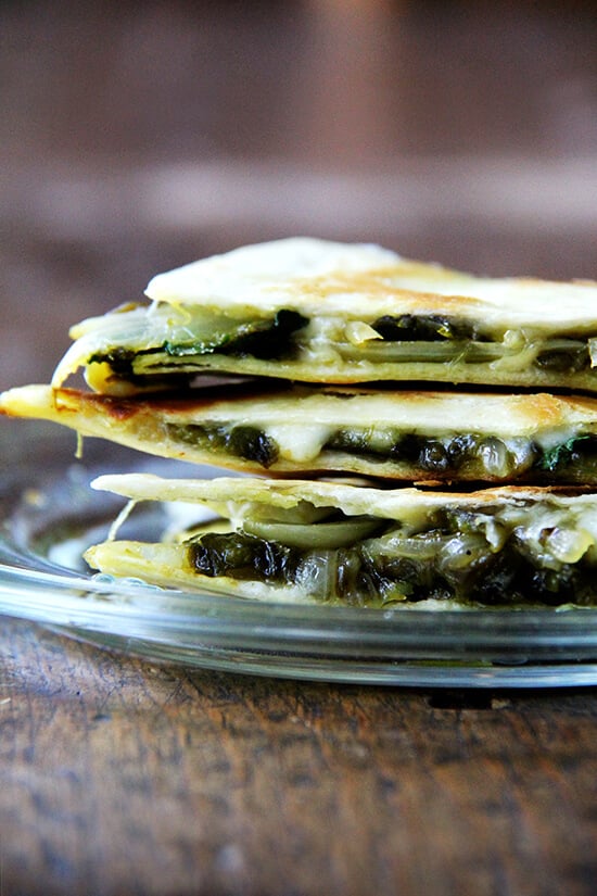 There is something so good about this simple quesadilla, about tasting each element — the smoky peppers and sweet onions, the bright cilantro, the creamy, melty Jack. As with pizza, less is more with quesadillas — a thin layer of ingredients is best. Before serving, I love stretching open the cheese-locked layers and dropping in spoonfuls of sour cream. // alexandracooks.com