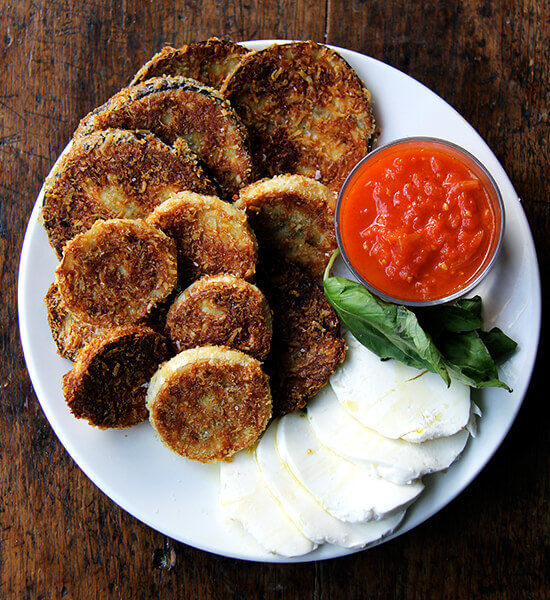 A plate of crispy eggplant rounds.