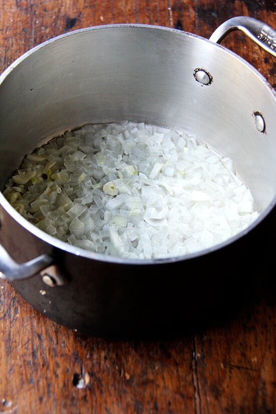 A soup pot with onions and garlic, softened. 