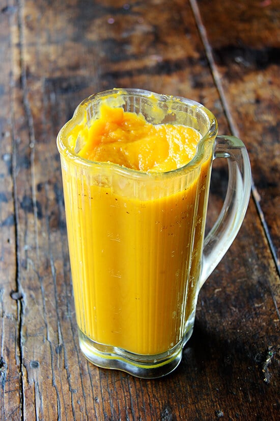 A blender filled with puréed squash.