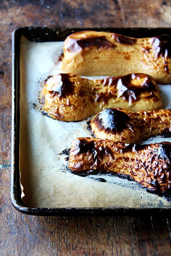 Roasted butternut squash on a sheet pan. 