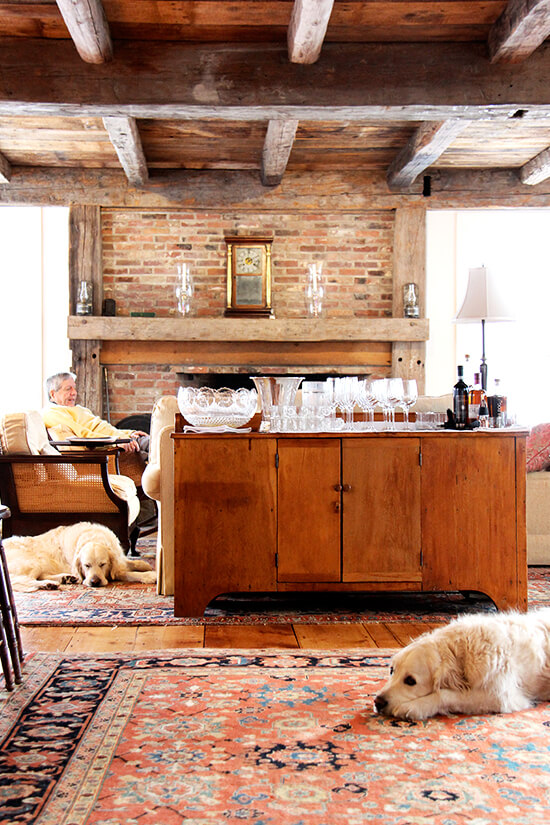 A farmhouse in Vermont with golden retrievers sleeping. 