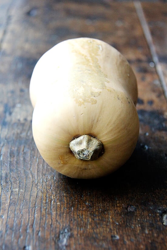 A butternut squash on a table. 