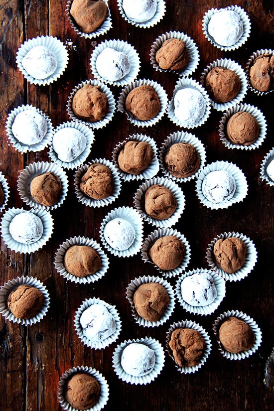 Chocolate truffles on a board.