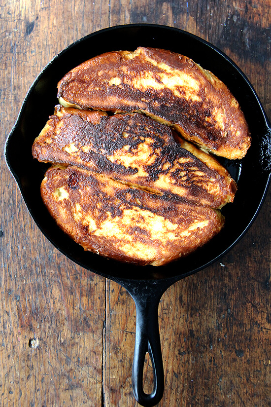 Challah bread french toast in a skillet