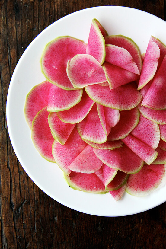 Watermelon radishes on a plate.