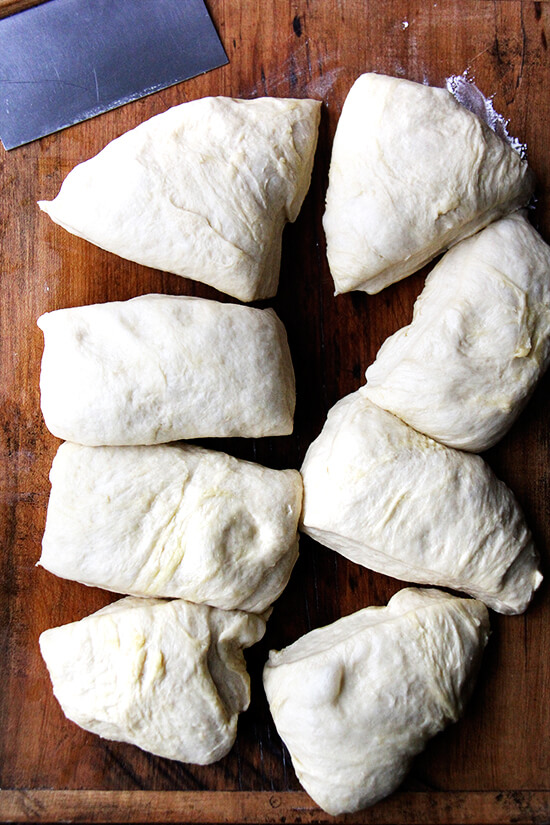 Dividing the challah bread dough into portions.
