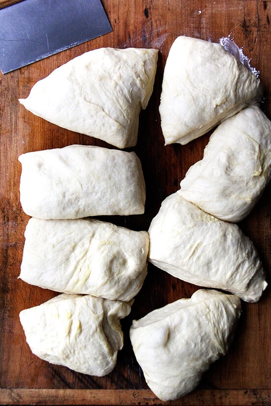 Dividing the challah bread dough into portions.