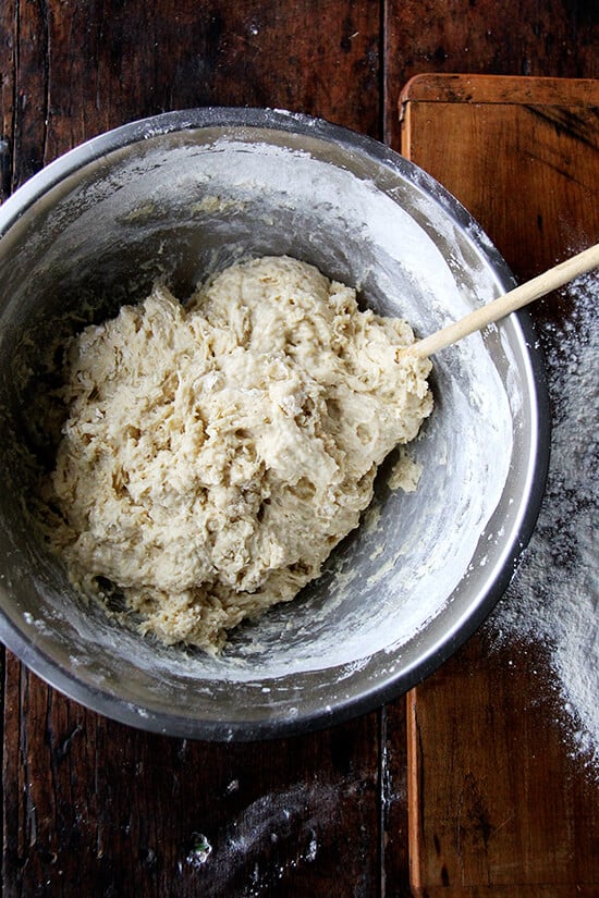 mixing the challah bread dough into a sticky mass