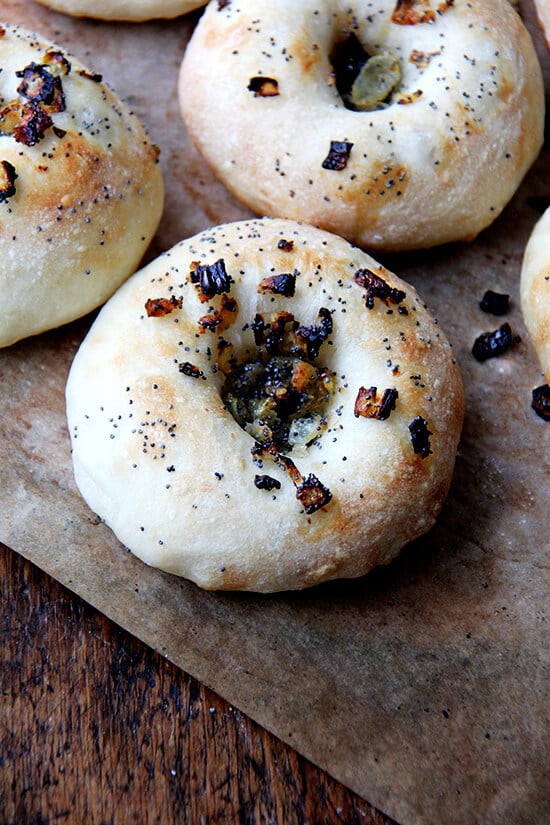 A just-baked bialy on a board.