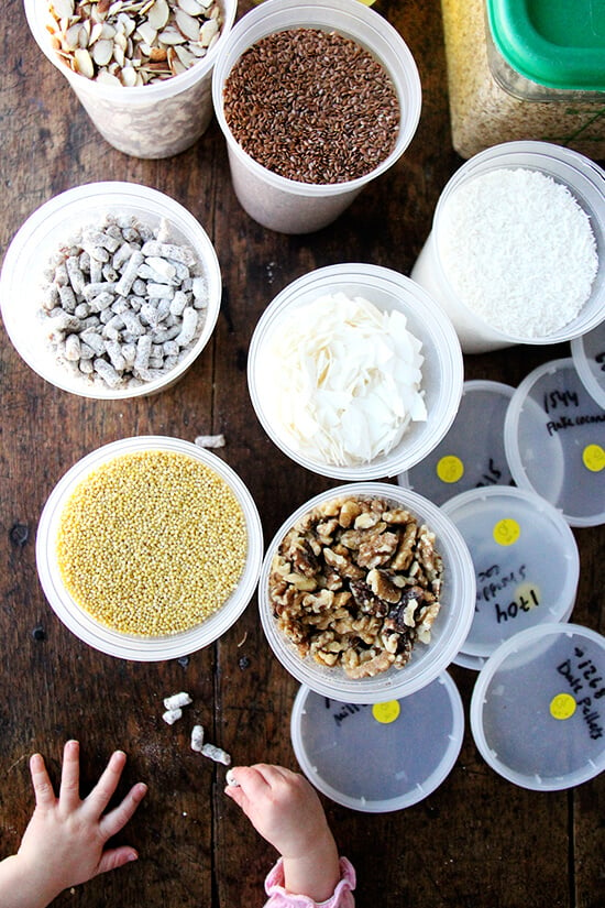 A table filled with bulk food shopping items. 