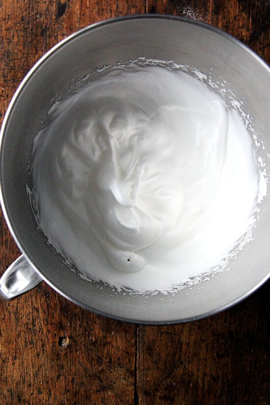 beaten egg whites in a bowl