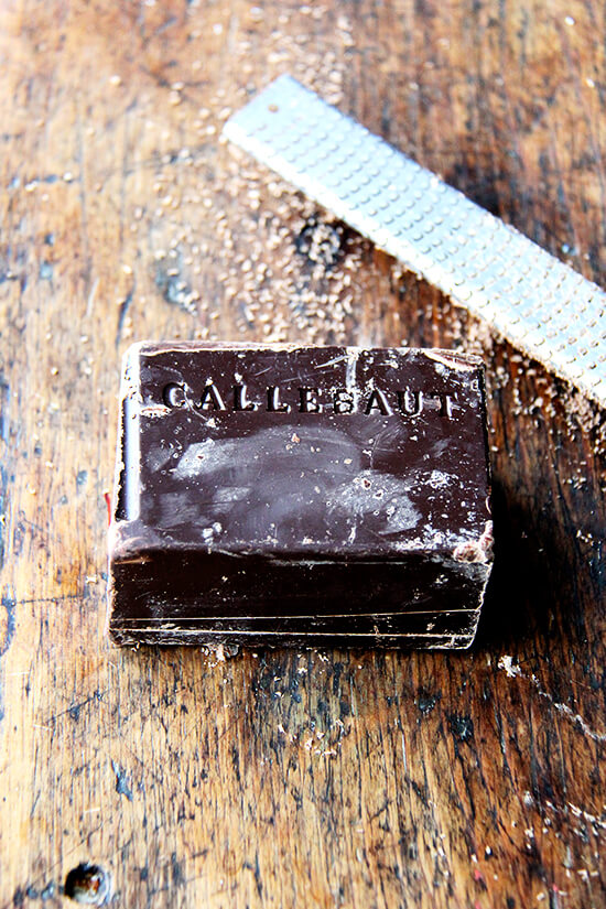 a block of Callebaut chocolate aside a microplane grater