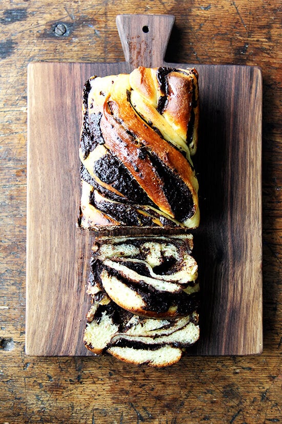 A board with orange-chocolate babka, sliced