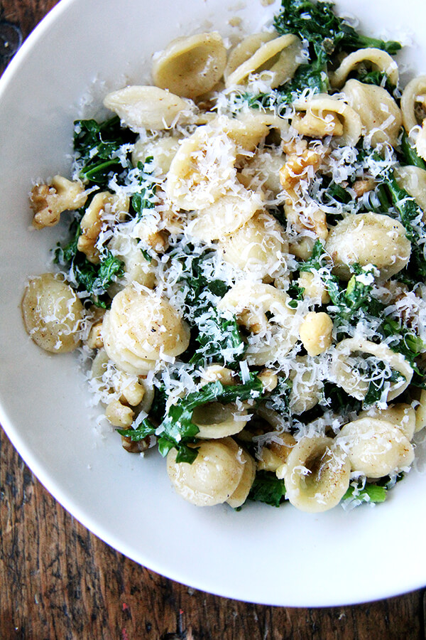 This recipe for orecchiette with Swiss chard, brown butter and walnuts is another version of a favorite recipe I make all winter with Brussels sprouts. Here, the pasta is simply drained over the chard or kale — just enough to wilt it — and when you use baby Swiss chard or kale it is especially good. // alexandracooks.com
