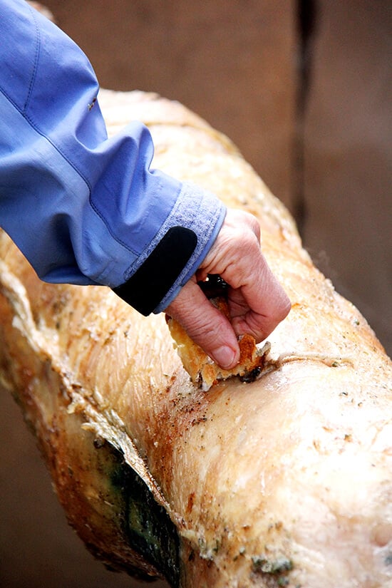 Rubbing lamb with bread