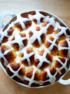 A pan of freshly baked hot cross buns.