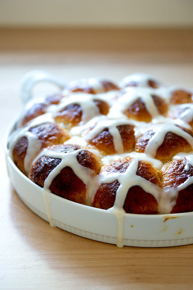 A pan of freshly baked hot cross buns.