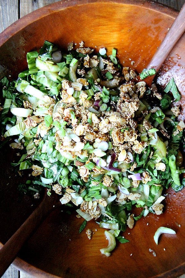 A large salad bowl filled with bok choy salad. 