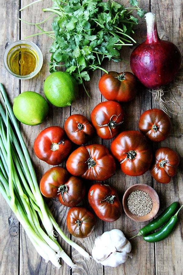 Ingredients for salsa fresca on a board.