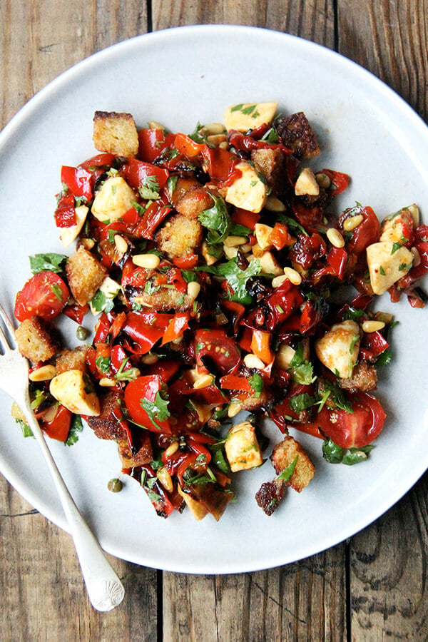 Folded into olive oil-fried bread, this magic peppers salad made a lovely panzanella salad but could have easily become a bruschetta or simple grain or pasta salad. Much to my delight, making this panzanella felt nothing like hard work. It was almost as though the salad assembled itself. Perhaps "hard work" is a state of mind. Hmm...deep thoughts. // alexandracooks.com