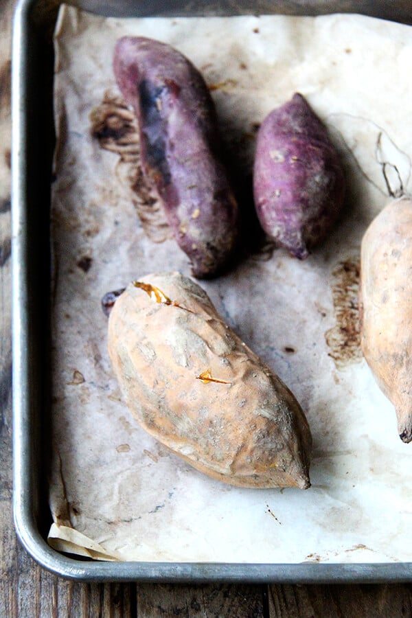 roasted sweet potatoes on a sheet pan