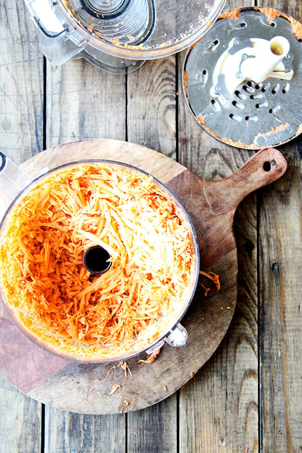 grated sweet potatoes in a food processor