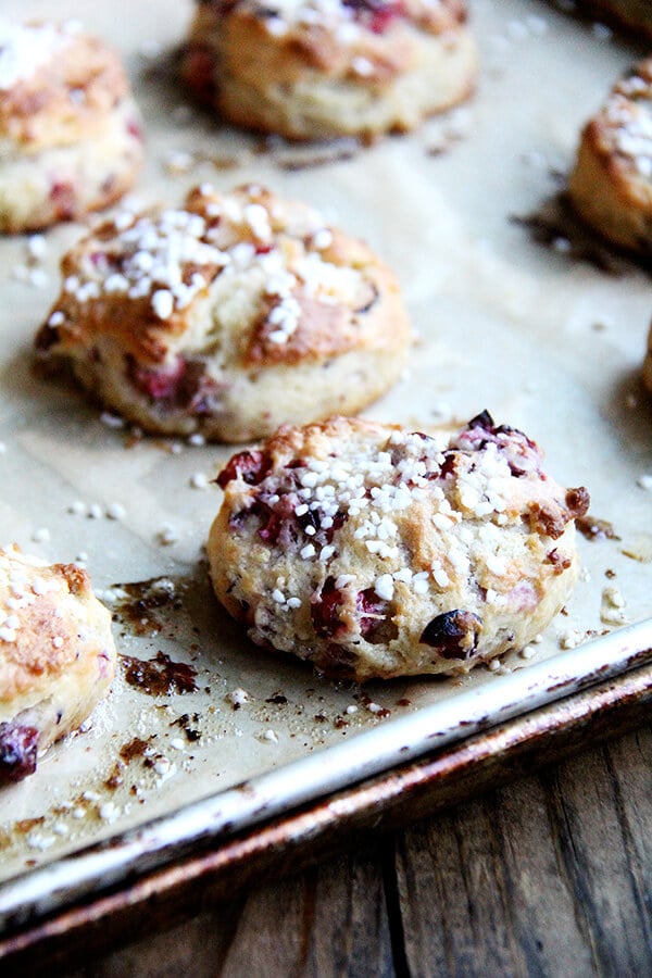 A tray of just-baked, pearl sugar-topped cranberry scones.