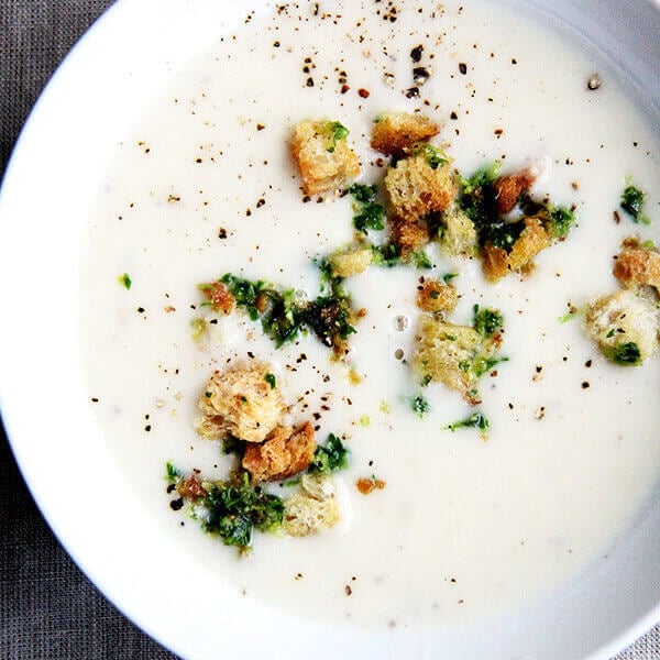 Recently, I've been living on this recipe for Fisher's creamy potato soup. Simple and delicious, the ingredients come together quickly: sauté two onions, add four peeled potatoes and water, simmer till tender, add milk (thickened with a roux), and purée. A deeply satisfying soup perfect for the colder months of the year! // alexandracooks.com