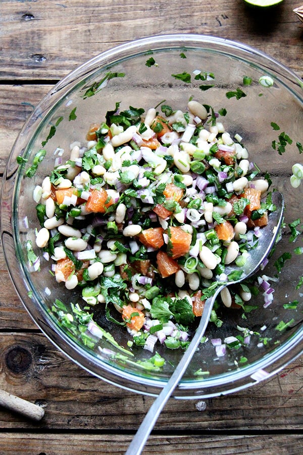 A bowl of white bean salsa.