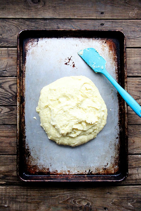 spreading gnocchi batter onto sheet pan